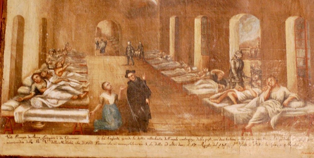 An ex-voto of the Plague of 17 Aug 1813 of Anna Lungaro showing the pest Hospital Valletta. The light house on Fort st Elmo can be seen through the arch where an attendant with a mask around his face is fumigating the foul air. (Sanctuary Our Lady of Mellieha)