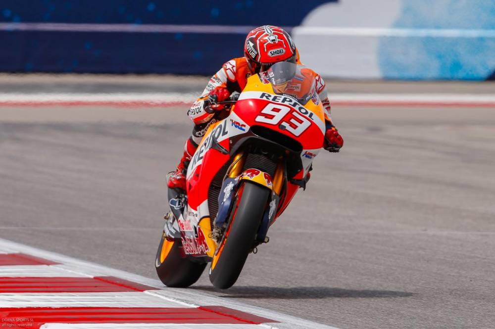 Marquez duels Rossi to take pole at Brno