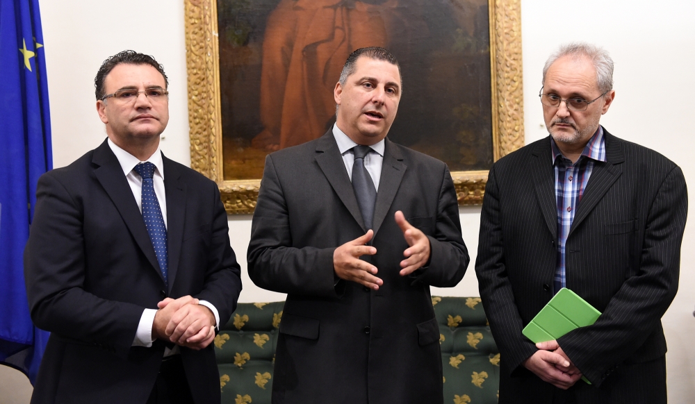 Robert Cutajar with Gordon Galea (right) and David Agius (left) Photo by Ray Attard