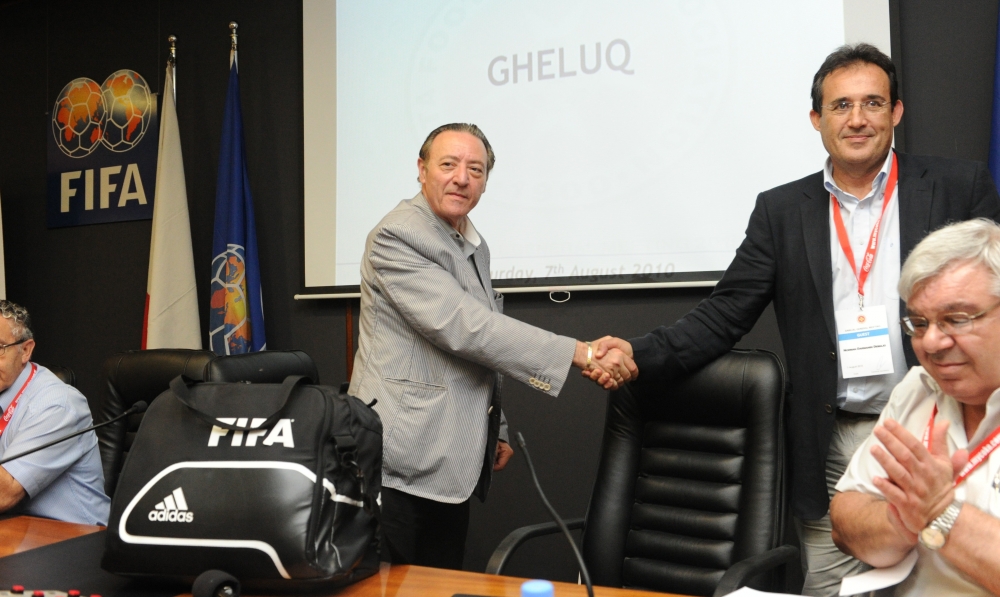 Norman Darmanin Demajo (right) shakes hands with Joe Mifsud after the 2010 elections