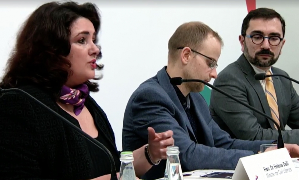 Civil liberties minister Helena Dalli addresses a press conference.
