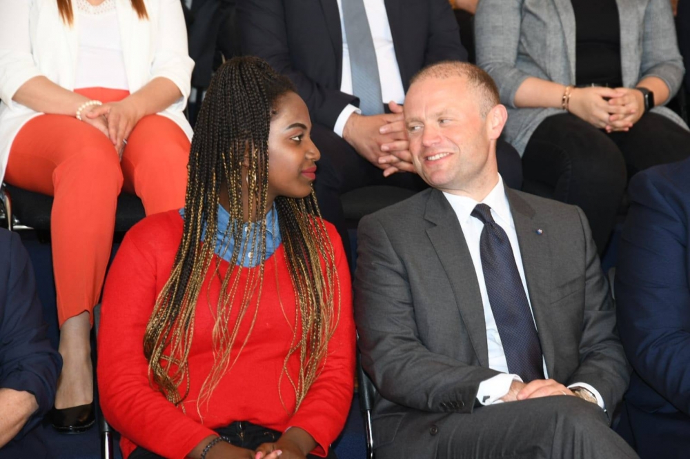 Joseph Muscat (right) in conversation with Thea Mizzi after her speech in Hamrun