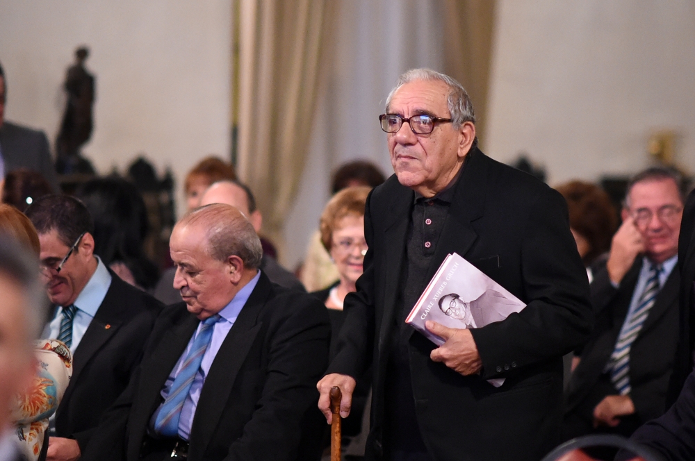 Dom Mintoff's brother, Fr Dionysius Mintoff, holding the latest book on his brother's political life (Photo: Ray Attard) 