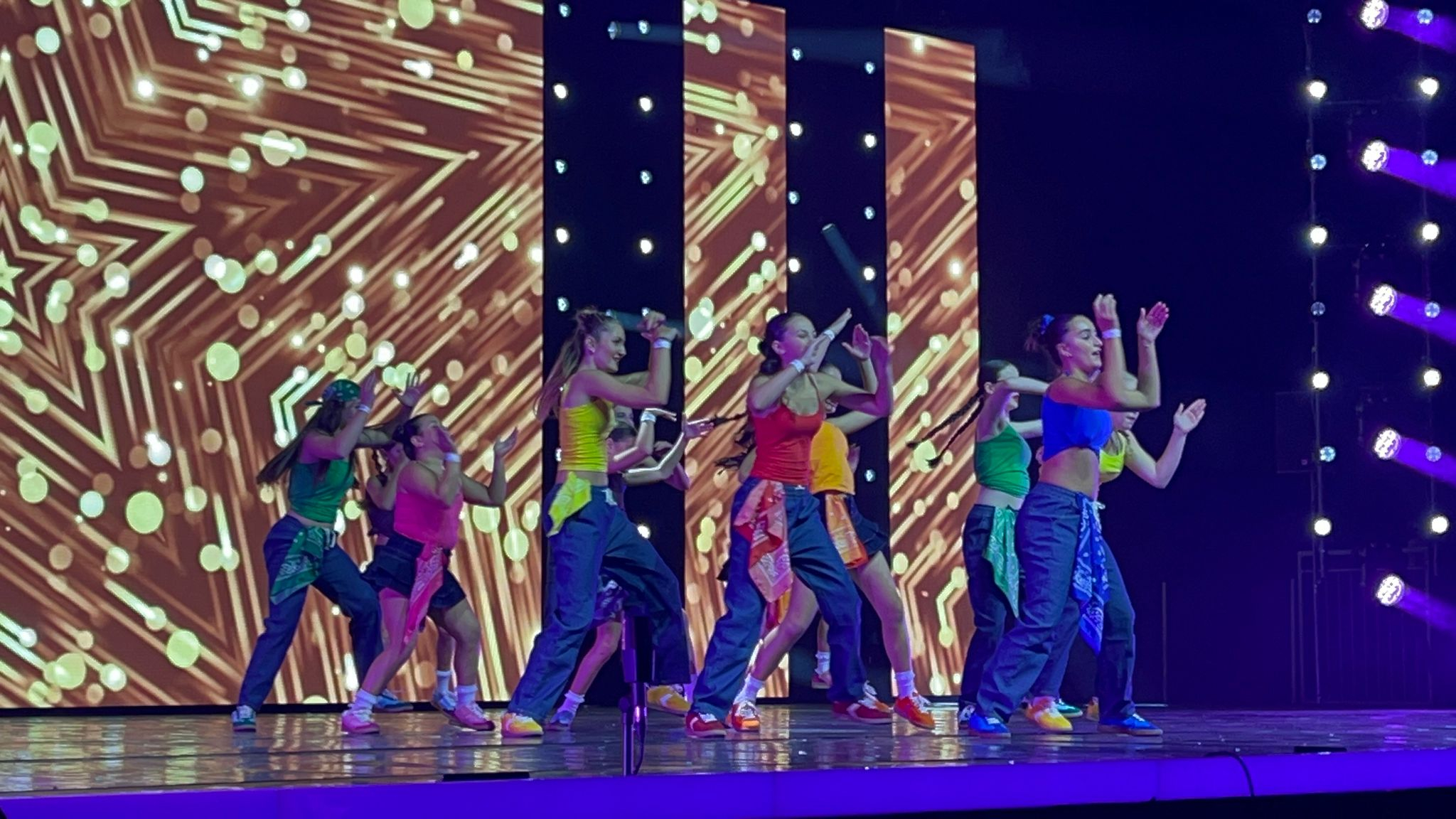 Maltese dancers performing on stage at the CYD Convention