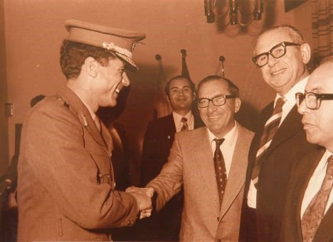Anton Buttigieg (right) with Dom Mintoff meeting Muammar Gaddafi