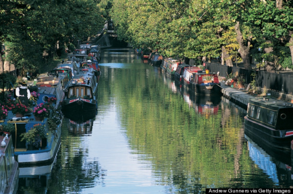 Police are investigating a body found in a suitcase in Grand Union Canal