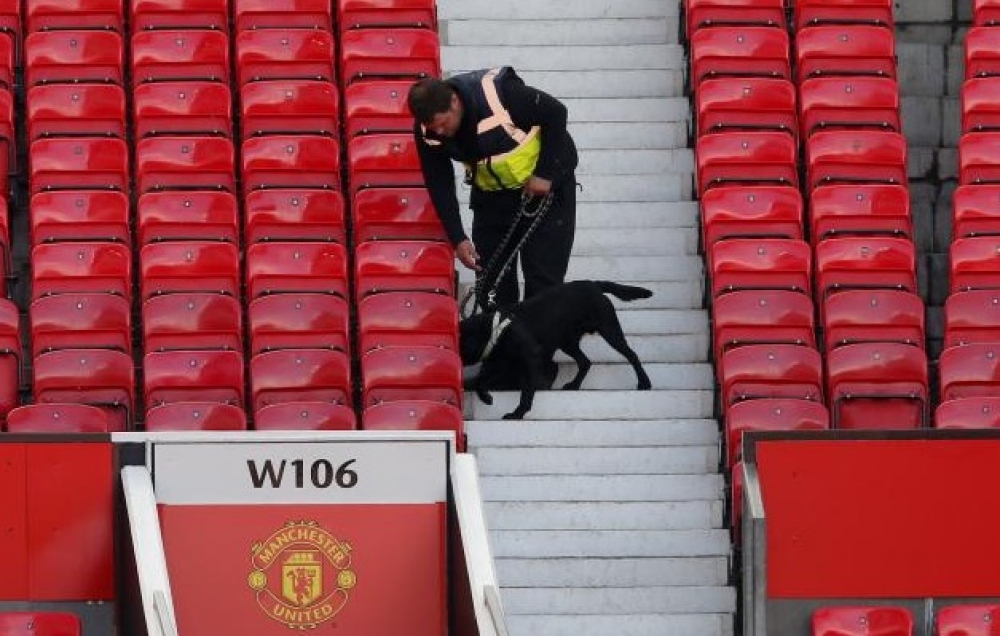 A police dog after the match was abandoned