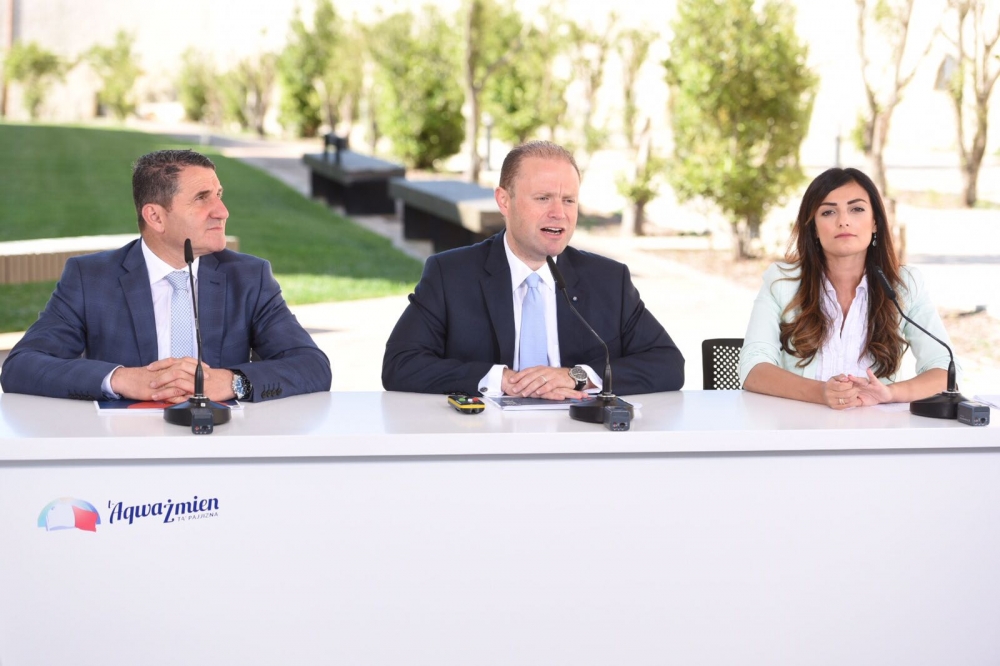 Rosianne Cutajar (right) with Prime Minister Joseph Muscat and MP Silvio Parnis (left) during last year's election campaign