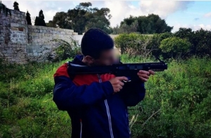 Instagram gun pose earns church school student suspension