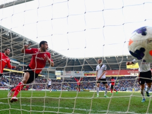 Caulker double hands Cardiff victory over Fulham