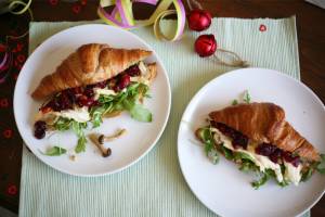 Croissants with fried mushrooms, soft French cheese and cranberry sauce