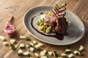 Rack of lamb, zucchini and fennel soffritto with thyme infused lamb jus