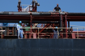 Migrants on Danish oil tanker transferred to NGO rescue ship