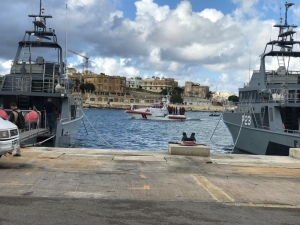 Migrants disembark in Malta after nine days at sea