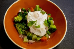 Poached eggs in bacon broth