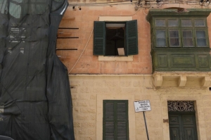 Man falls three storeys after roof collapses