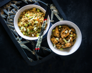Korean style sticky chicken with cauliflower egg fried rice