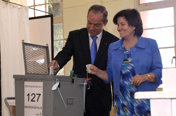Then Prime Minister Lawrence Gonzi, with his wife Kate, casting his vote in the divorce referendum