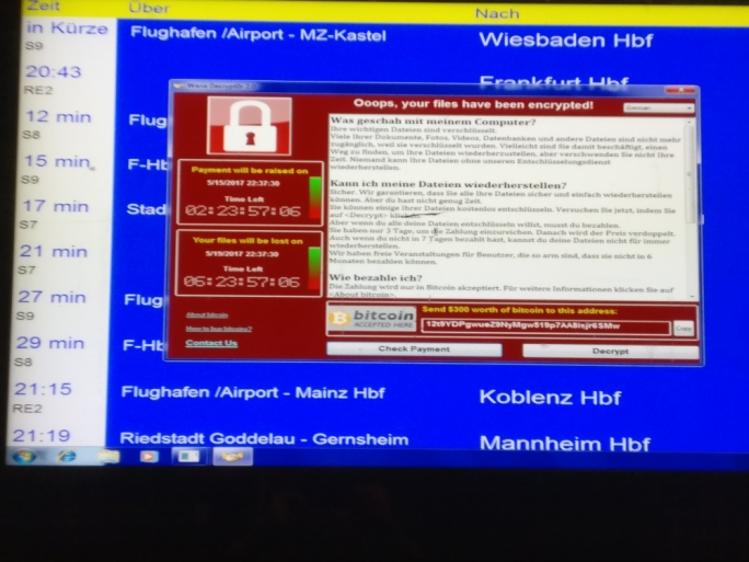 A message from the ransomware as seen on German airport electronic noticeboard (source: Twitter)