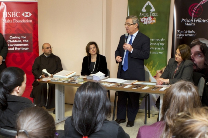 Minister for Education and Employment Evarist Bartolo congratulating students together with (right to left) Prison Chaplain Fr Franco Fenech , HSBC Malta Foundation Deputy Chairperson Sarah Watkinson, and Commissioner for Children Helen D'Amato.