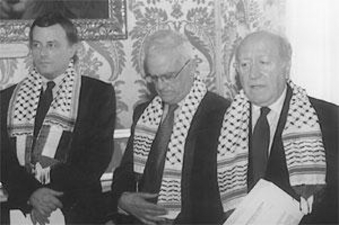 File photo: Alfred Sant, Eddie Fenech Adami and Guido de Marco, wearing the keffiyah, later joined a Palestinian peace march