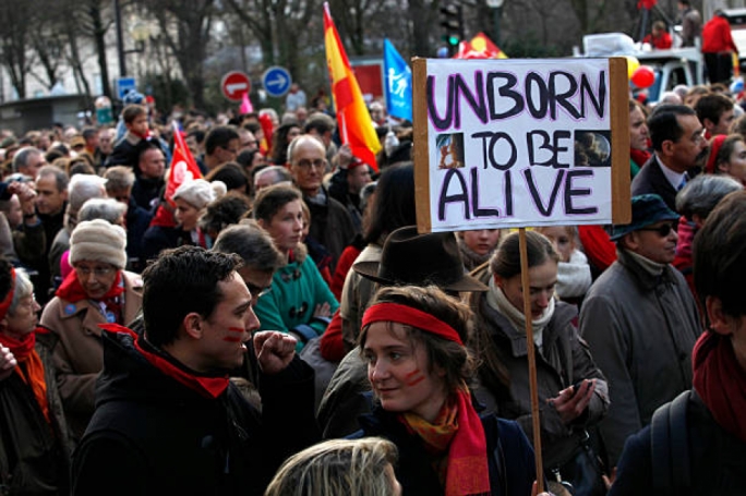 Protestors calling for the removal of abortion laws in Paris, France
