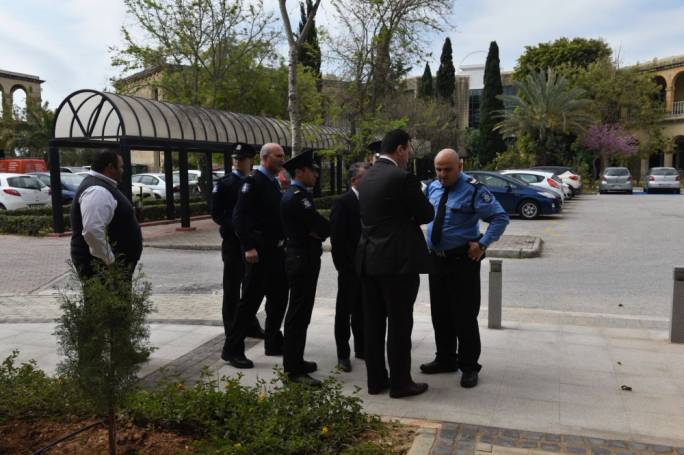 PA executive chairman Johann Buttigieg talking to police outside the Planning Authority building