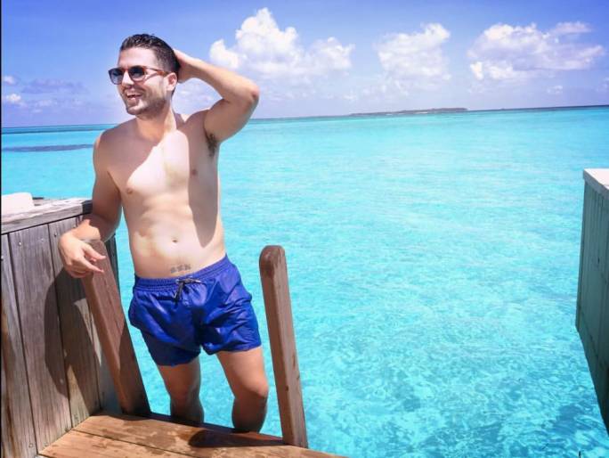 Oh, just another casual photo in the Maldives. Does that tattoo on the midriff read 'BEN'?