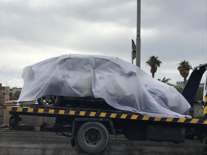At 12.30pm, the Opel Astra was loaded onto a Police loader truck for transportation to Headquarters for further examination