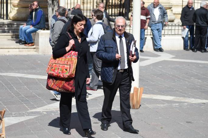 Daphne Caruana Galizia leaving the law courts with her lawyer Joe Zammit Maempel