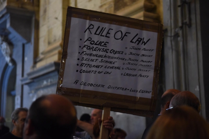 Activists called on the authorities to find the people behind Caruana Galizia's murder. (Photo: James Bianchi/MediaToday)