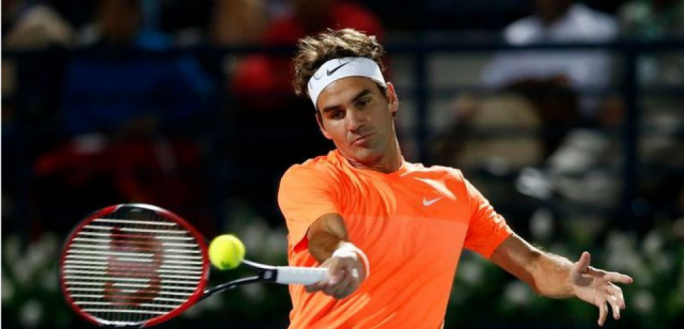 Roger Federer in action against Novak Djokovic at the ATP Championships