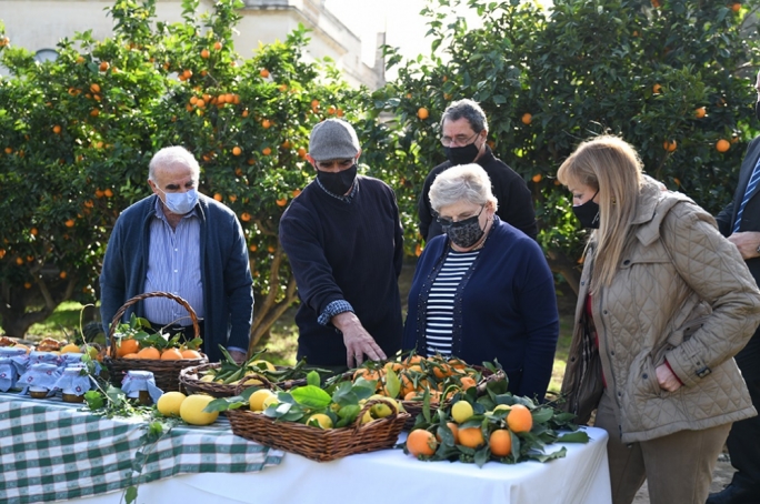 President George Vella and Miriam Vella meet staff at the orchard