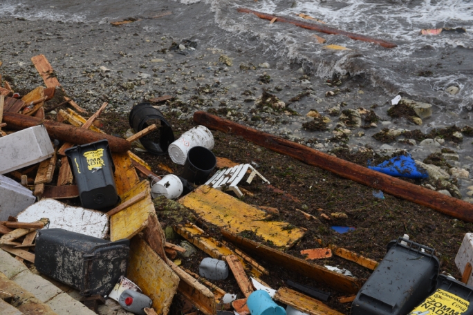 At Balluta Bay, scores of waste (mostly plastic and wood) was being carried out to sea