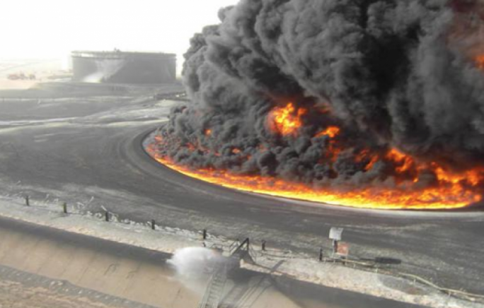Seven of the 19 oil tanks at Al-Sidra were ablaze on Sunday as a result of the fighting.