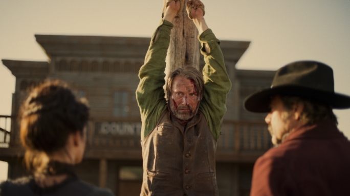 Mads Mikkelsen finds himself between a rock and a hard place