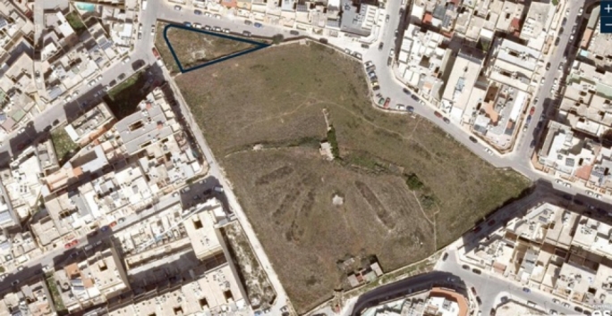 Aerial view of the site marked in blue where a private old people's home will rise to nine floors. The new Marsaskala school has been built in the field adjacent to the blue triangle but is not visible in this dated photo.