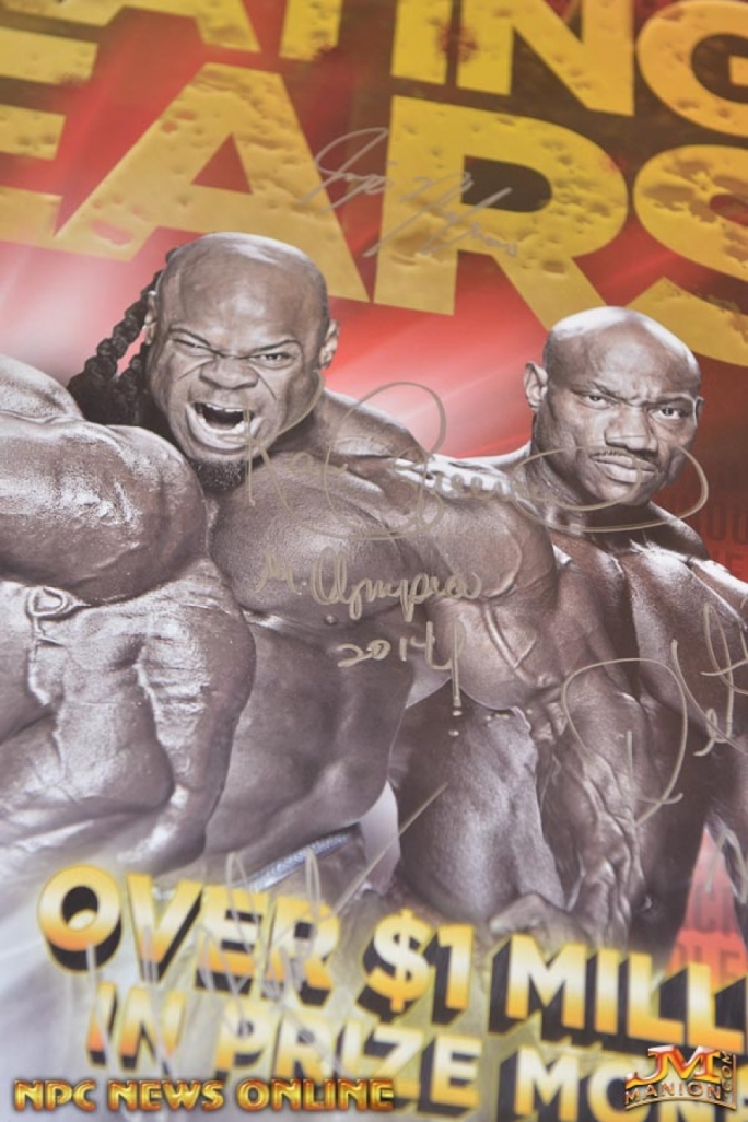 Kai Greene's signature on the 2014 Mr. Olympia poster