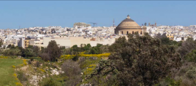 A photomontage showing the Naxxar towers in the background and the Mosta dome in the foreground
