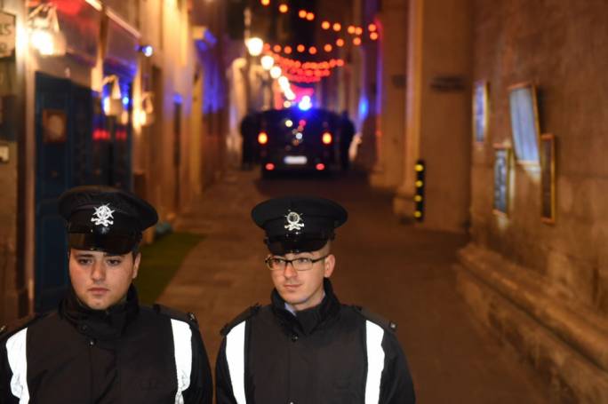 A heavy police presence can be felt outside and inside the law courts
