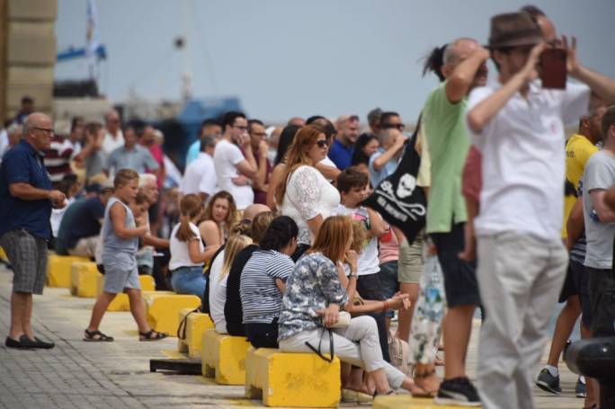 People gathered at the Valletta waterfront to follow the day's races