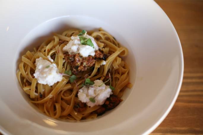 Taglialoni with sausage, harissa and lemon ricotta