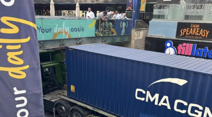 Trailer stuck under Bay Street Bridge