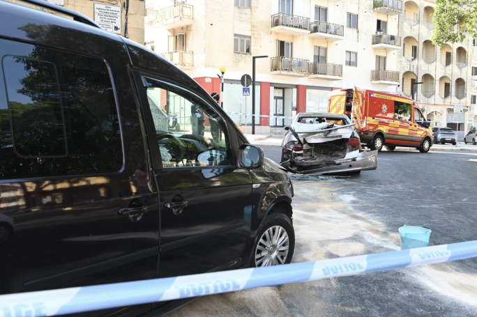 Two hospitalised after car crashes into parked vehicle, striking pedestrian