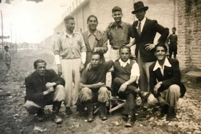 Evacuated from Fraschette in 1944, the Maltese migrants were taken to Fossoli. Romeo Cini stands second from right