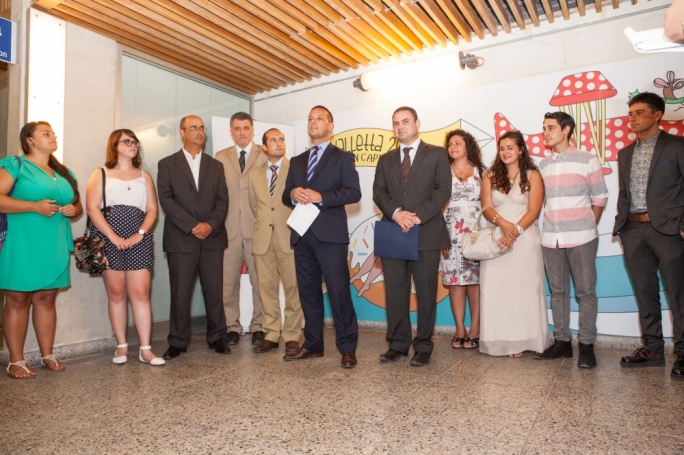 V-18 chairman Jason Micallef (centre) flanked by justice minister Owen Bonnici (right) and MCAST principal (fourth from left) Stephen Cachia, and other MCAST students