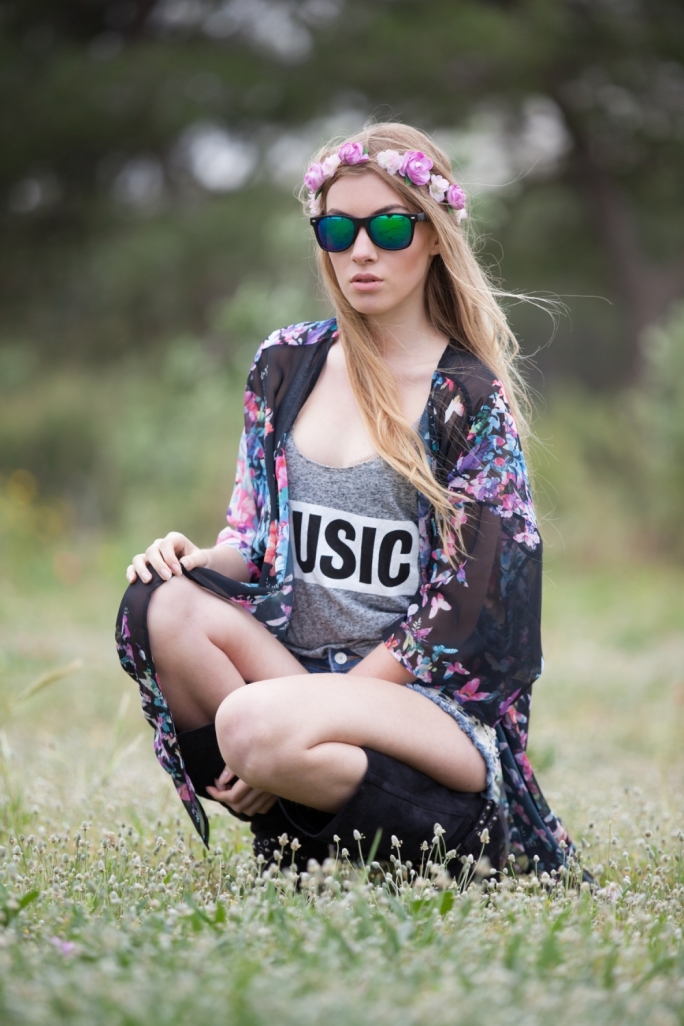 Jennyfer 'music' vest, €9.95 Jennyfer denim shorts, €19.99 Bershka kimono, €35.99 Tally Weijl garland, €5.95 Tally Weijl shades, €7.95
