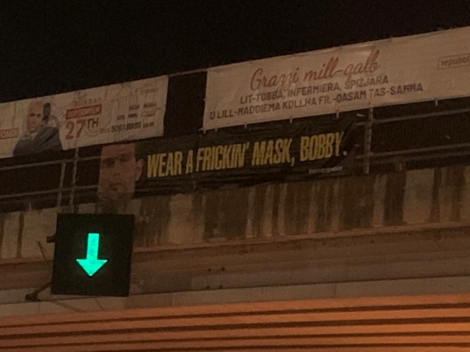 Banner: 'Wear a freaking' mask Bobby' highlighting the PM's aversion to wearing a mask