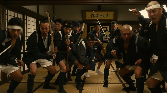 Criminal carnage: a film crew is determined to record a bloody battle between the two biggest criminal syndicates in Japan