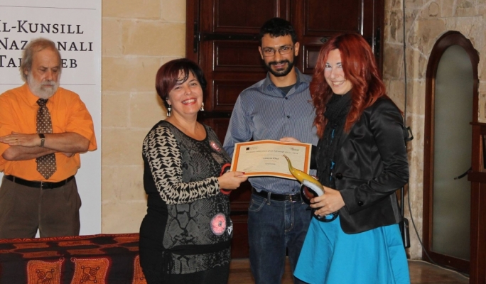 Leanne Ellul receiving the Novels for Youth prize for her novel 'Gramma'
